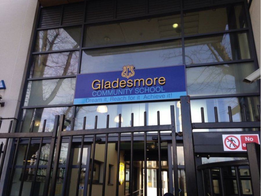 Bespoke entrance signage identifying a school